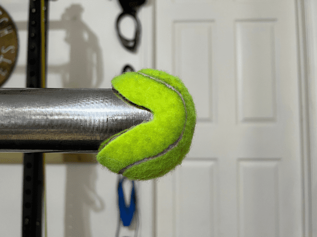 Tennis Ball on the End of Barbell